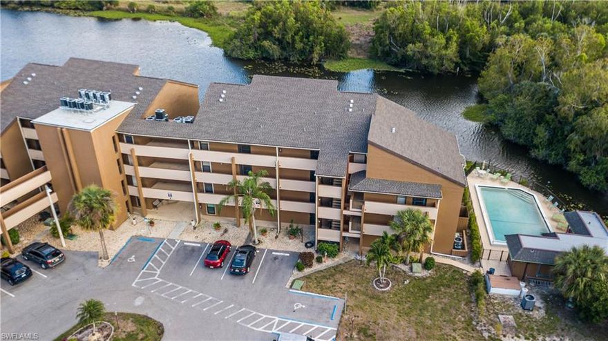 Welcome Home To Lakeside At Lochmoor - An Intimate Enclave Of 32 Waterfront Condominiums. Conveniently Located Off Hancock Bridge Pkwy & Orange Grove Blvd. Perfectly Positioned 1st Floor Unit Bright & Light W/Screened Outdoor Living Area & Screen Door Access To Beautiful Lake & Community Dock. This Lovely Screened Lanai Through A Triple 8 Foot Set Of Floor To Ceiling Sliding Glass Doors Overlooking The Lake & Preserve Beyond! New Ceiling Fan AND Metal Roll Down Shutters Provide For Additional Safety And Security, Completing This Private Outdoor Living Lanai Area W/Private Entrance To The Primary Bedroom. Enjoy The Single Family Home Feel Of This Well Maintained 1st Floor Unit Back Inside With A Great Room Designed Floorplan Boasting A Split 2 Primary Bedroom Design W/Private En Suite Baths. Each Of The Bedrooms Features An Impact Glass Window, Metal Roll Down Storm Shutters, And Decorative Plantation Shutters. Additionally, They Each Have Beautiful Warm Hardwood Floor Surfaces. The Front Bedroom Has A Jack & Jill Bathroom Feature Perfect For Entertaining And/Or Overnight Guest Use. The Primary Bedroom At The Rear Of The Home, Through A Private Alcove Entrance Overlooks The Lake & Private Access To The Rear Screened Lanai For Quiet Evenings Enjoying The Breeze Off Of The Lake. The En Suite Bathroom Area Feature A Large Dressing Area, Multiple Closets, & Dual Sinks. The Updated Shower & The Toilet Are In Their Own Space For Privacy Behind A Pocketed Sliding Interior Door W/Large Linen Closet. The Chef's Kitchen Is Well Designed W/Pantry Closet, Interior Laundry Room. Updated W/Hardwood Cabinetry, Stainless Steel Appliances, Dramatic Granite Countertops, Designer Ceiling & Lighting. Convenient Pass-Through W/Seating Space Overlooks Great Room, Screened Lanai & Lake. The Lakeside At Lochmoor Community Features Newer: Paint, Roofs, Pavement, & Fishing Docks. The Heated Swimming Pool Has New Pool Side Furniture, Black Metal Fencing, & Light Fixtures. Additionally, There Is A Bathroom & A Refreshed Community Room W/New Air Conditioning, Furnishings, & Lighting. This Community Is FULLY Insured W/Flood & Hazard Policies In Place. There is Convenient Additional Storage For This Unit Located In A 4th Floor Storage Closet Of This Same Building Accessible By A Community Elevator. Additionally, A Low Cost Covered Parking Space Is Available Near The Front Of The Unit. Enter Lakeside At Lochmoor Beneath A Beautiful Mature Oak Canopy Draped W/Spanish Moss. Sitting On 2.5+/- Acres W/Open Green Spaces & Beautiful Mature Landscaping. Monthly Assessment Includes Water, Sewer, & Exterior Pest Control. Nearby, El Rio Is An 18 Hole, Par 60 Golf Course, Offering Pay As You Play Tee Times! Also Rosen Park W/Public Boat Ramp Is About 2 Miles Away W/Boat Slips Available For Rent! Access Downtown Fort Myers By Trolley, Or 1 Mile Walk Over The New Sidewalk Downtown To Enjoy Shops, Restaurants, Nightclubs, & Live Theater! This Is A Perfect Place To Call Your New Home Today!
