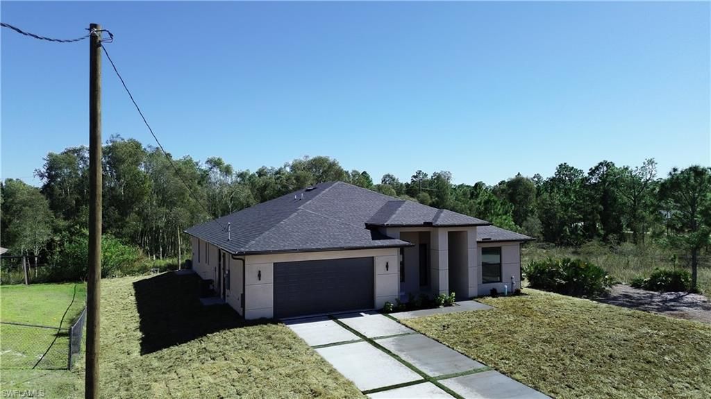 Photo of 861 Bancroft AVE, LEHIGH ACRES, FL 33974 (MLS # 226005963)