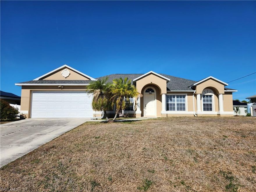 Cape Coral 4 bedroom plus den home in the expanding NW quadrant of the city.  The large Master BR and bath are separated from the other 3 BRs.  Master BR features include a nice size walk in closet, dual sinks, tiled shower and garden tub.  The home has a formal dining room as well as a breakfast table area on opposite sides of the kitchen.
The open concept kitchen features a big breakfast bar as well as the breakfast table area.  The huge family room area opens to the breakfast bar, breakfast table area and the den.   Lots of room for family and guests including a good size screened in lanai. The other 3 BRs are very roomy and share a common bathroom.  The roof and garage door were replace in 2023. The home was painted inside and outside in 2023 as well. The HVAC system was replaced in 2024.  Plenty of room in the back for a pool.  Excellent opportunity for a large family or investor.