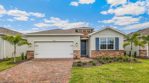 Photo of 18166 LAGOON REACH LN, NORTH FORT MYERS, FL 33917 (MLS # 226029091)