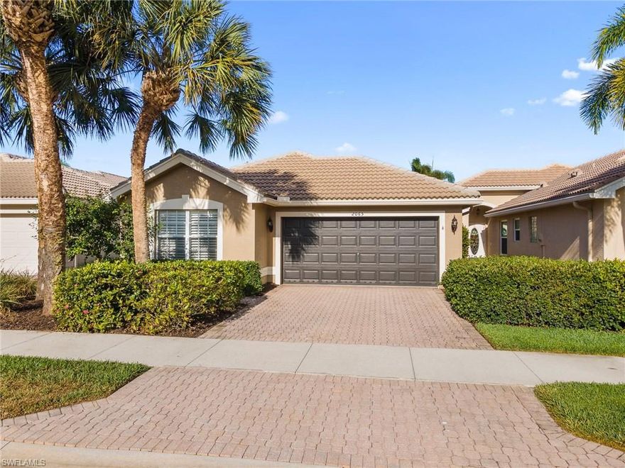 A great chance to own a great home in a great community! This wonderful two bedroom plus den "Cortina" model home is waiting for you. Original owner has taken detailed care of the property. New kitchen stainless steel appliances (2020). AC unit is only four years old. Tile throughout the main areas and carpet in the bedrooms. . Plantation shutters throughout the home. Den has built in desk and double door entry. Upgraded cabinets in the kitchen with crown molding (coffee color) with upgraded granite countertop. Exterior painted in 2021. New garage door spring & rollers 2021 (lifetime warranty) 
Saturnia Lakes has so much to offer as well, including low HOA fees! Community pool, hot tub, fitness center, tennis courts, walking paths. Conveniently located in North Naples near shopping, dining and a quick drive to 75 and the Southwest Florida Airport. Put this one down to see today! Watch the full walkthrough video NOW!