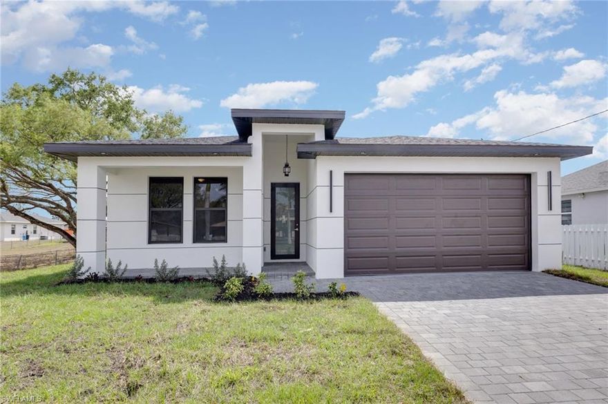 Delightful 3-bedroom, 2 bathroom and 2 car garage home in Lehigh Acres in quiet neighborhood. High ceilings, modern chic cabinets and beautiful tile floors throughout house. Open layout for kitchen, living room area and dining area. Attractive new fans in bedrooms and living area and contemporary lighting throughout the home. The house has a shaded modern glass door and a paved lanai. Spacious backyard that leaves room for fence or porch.