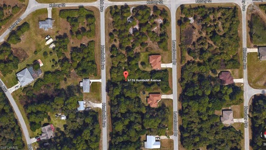 This great east Fort Myers, Buckingham Lot backs up to another lot for sale by the same owner! This is a great chance to build on property and have no neighbors behind you! Don't miss this great opportunity!