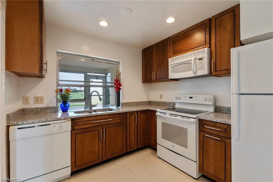 LIVE BRIGHTLY at this Golf Course, Lake View, Attached, Villa with a 1 Car Garage in Lakewood! Enjoy the Public Golf Course with optional social/recreational/golf memberships. This Villa has NEW Tile floors throughout! NEW Appliances and Granite in the Kitchen. LOW HOA Fees make this Villa a wonderful option to LIVE the Lifestyle you were meant to! Lakewood is close to wonderful beaches and shopping all around. ******AGENTS SEE NOTE FOR YOU in confidential*****!