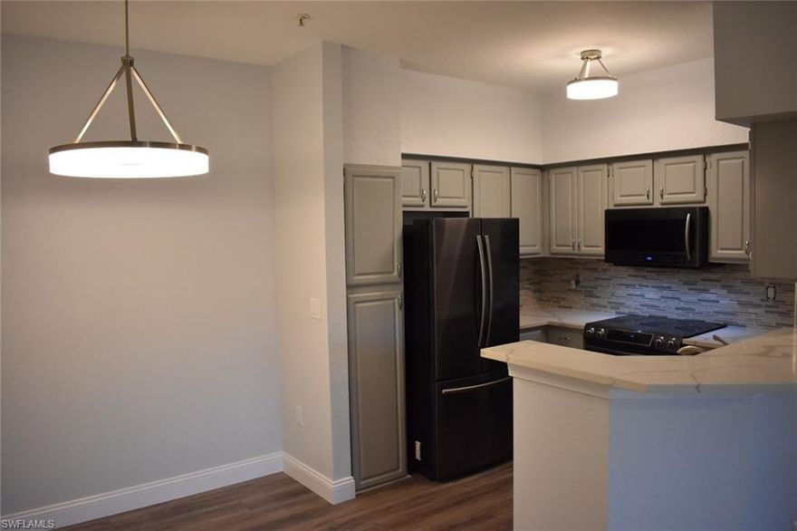 Beautifully Remodeled 2nd Floor Unit with Lake Views and large lanai.  This condo is just across the street from renowned Coconut Point Mall as well as the brand new hospital being built.  There is no better location to be at in Lee County.  Close to the beach, restaurants, and shopping.  The condo has 2 bedrooms and 1 full bath with large custom walk in shower.  The kitchen has been remodeled with all new black stainless appliances and beautiful quartz countertops.  If your looking for a condo in Bonita Springs, look no further as this has it all.