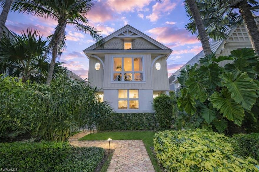 Luxury living in one of Downtown Naples’ highest elevation locations, offering exceptional hurricane protection and peace of mind. Experience the finest in Olde Naples living in this stunning single-family residence, built in 2012 and perfectly situated on a beautiful, quiet, tree-lined street in one of downtown’s most coveted locations. Offering nearly 3,000 square feet under air of thoughtfully designed living space, this charming residence features three bedrooms, three and a half baths, a beautifully appointed chef’s kitchen, and open living and dining areas ideal for everyday living and entertaining. The kitchen showcases custom cabinetry, high-end appliances, and premium finishes that inspire culinary creativity. Inside, wide plank oak flooring flows throughout the home, complemented by elegant granite countertops and refined architectural details that create a warm yet sophisticated atmosphere. Designed for the Naples lifestyle, the home features a unique courtyard-inspired layout that seamlessly blends indoor and outdoor living. The private outdoor setting includes lush landscaping, a beautiful pool and spa, trellised dining areas, and generous entertaining space. An indoor-outdoor sunroom adds incredible flexibility, easily converting from an open breezeway to a climate-controlled room with disappearing sliding glass doors. Just six blocks from the pristine white sand beaches of the Gulf and within easy walking distance to the world-class dining and shopping of 5th Avenue South and 3rd Street South, this home offers the rare opportunity to enjoy the very best of Olde Naples living in a peaceful and highly sought-after location. Additional features include an oversized garage, private gated access, and meticulously maintained grounds that enhance the charm and privacy of this exceptional property. This is more than a home — it is a true Olde Naples lifestyle opportunity. One or more photo(s) has been virtually staged, AI generated or rendered.