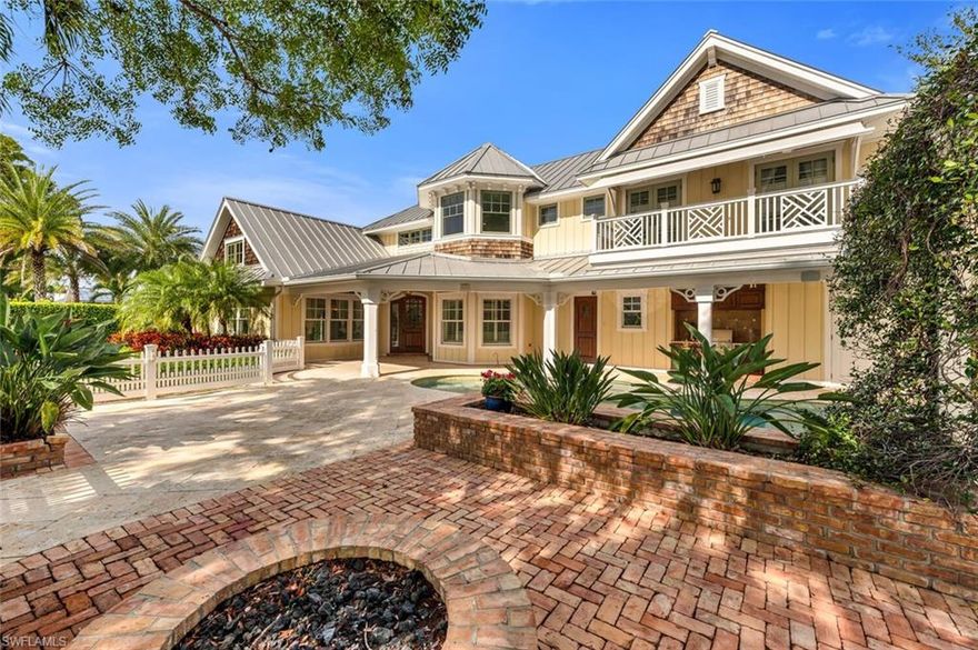 Welcome to 495 2nd Ave North, a beautifully designed coastal cottage crafted by Safety Harbor Builders and designed by renowned N.J. White Associates architects. This exquisite residence features 3 bedrooms, 3 and 1/2 bathrooms, and spans 3,130 square feet under air, with a total of 6,213 square feet. Nestled just 4 blocks from the pristine beaches of Naples, 3 blocks from the Naples Regional Library, and a mere 2 blocks from Naples Community Hospital, this home offers the perfect blend of convenience and tranquility. Inside, discover shiplap ceilings, hardwood floors, and meticulously detailed crown molding that add a touch of classic elegance. The gourmet kitchen is a chef’s delight, boasting Sub-Zero and Jenn-Air appliances, complemented by a spacious island that is perfect for both meal prep and casual dining. Lush private landscaping surrounds this charming home with a large pool and spa. The cedar shingle siding evokes the timeless appeal of Cape Cod. The adjacent lot is also for sale, presenting a unique opportunity. This coastal cottage is a true Old Naples gem.