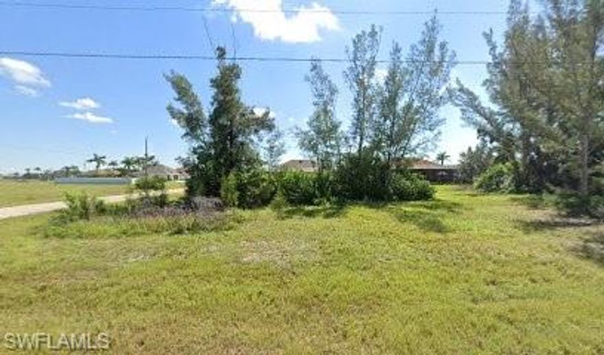 Corner vacant PREMIUM lot. Built your dream home in This Beautiful  lot in Cape Coral Community.