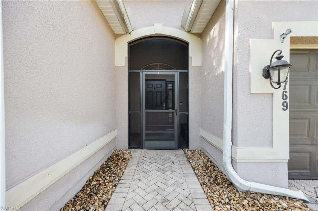 Photo of 2769 Inlet Cove LN W, NAPLES, FL 34120 (MLS # 226026544)