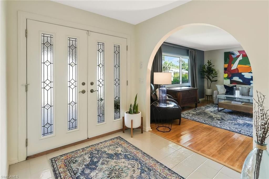 Photo of 10361 Windsor WAY, NAPLES, FL 34109 (MLS # 226014021)