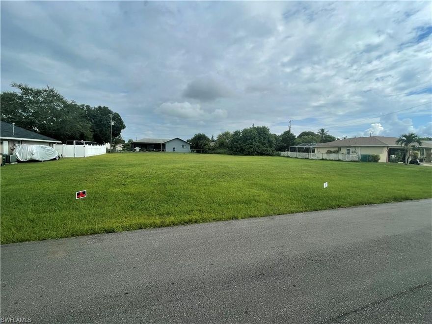 Build your Dream Home on this Desirable Over-Sized SE Cape Coral Lot with City Water and Sewer Available Saving you a Lot of Money by Not Having to Add a Well and Septic to your Construction Costs. Utility Assessments Paid! 
Centrally located off Country Club and Veteran's Parkway for access to shopping, dining, entertainment and minutes from Fort Myers.