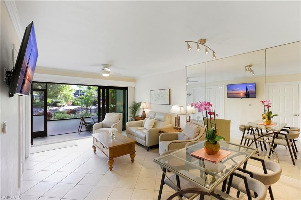 Photo of 600 Neapolitan WAY #105, NAPLES, FL 34103 (MLS # 225077932)