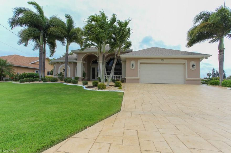 Don't Miss this Picture perfect home located on a Sailboat Access Canal minutes to the river.  This home has it all, features include, custom faux painting, coffer ceilings with tons of crown and backlighting, built-in entertainment center with fireplace,  wood cabinets with under-mount lighting, walkin shower, large soaking tub, his and her vanities, granite counter tops, travertine pool deck, custom boat dock w lift, meticulous landscaping, custom pool with spillover spa, newer appliances, and much more. Please read confidential comments.