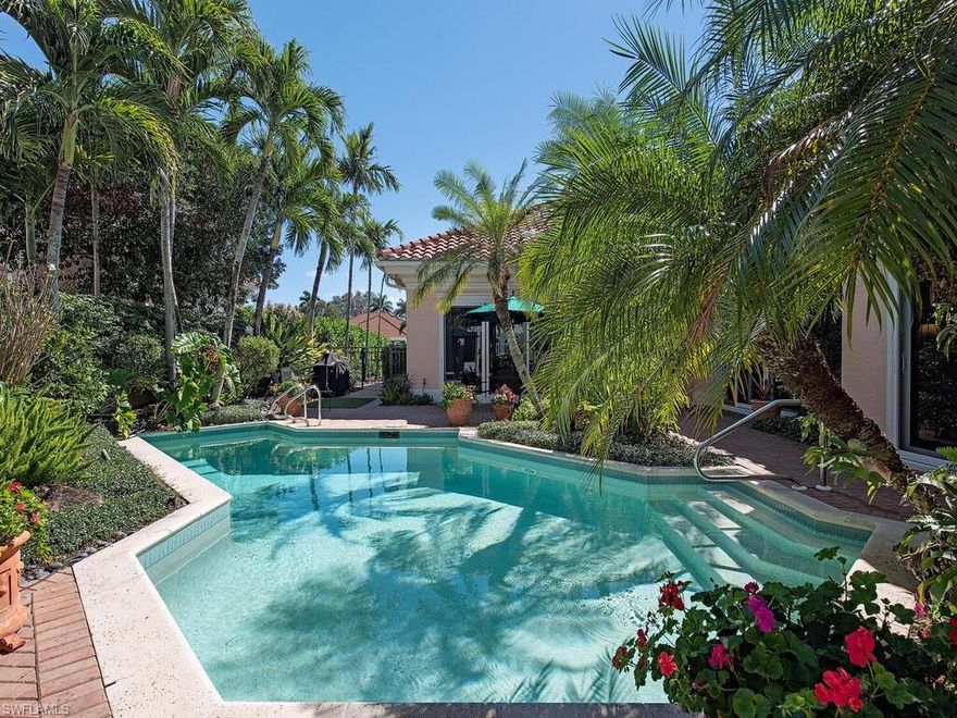 Come enjoy the sunshine in the inviting and sophisticated Isle Verde community.  A truly unique, special neighborhood with charm like none other.  This villa is located on the golf course (Bay#3) and offers the utmost in privacy with beautiful outside space in a tranquil, poolside courtyard. The main house offers two bedrooms and two and a half baths, the guest cabana offers one bedroom and private bath.  The property has been impeccably maintained and has numerous upgrades including custom shelving, recently remodeled master and guest baths, and a large screened lanai. Isle Verde is a gated community offering 24 hour security.  Pelican Bay amenities include nearly three miles of private beach, 18 tennis courts and biking/walking paths.