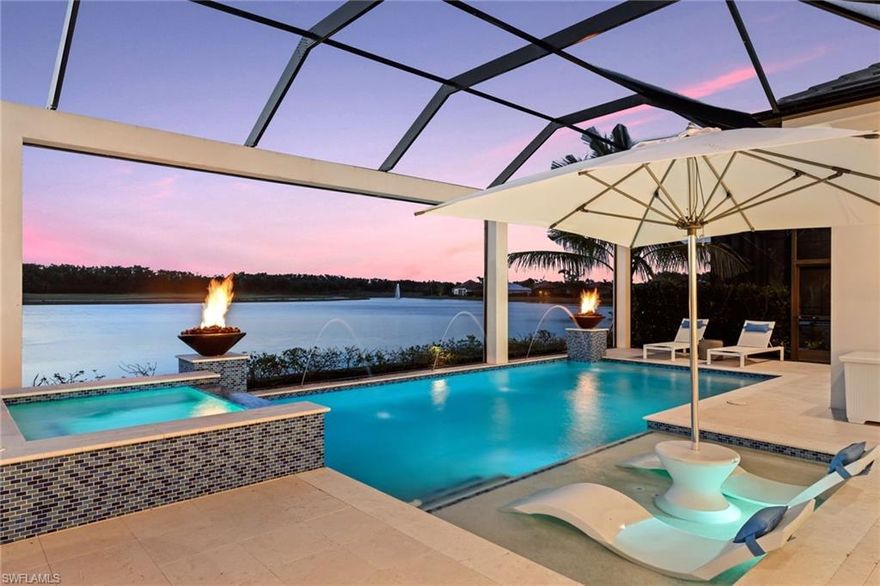 Modern waterfront elegance within the gates of Miromar. Steps to the Arthur Hills signature
championship golf course, a rarely available designer grand estate home awaits. Bright Western
exposure, sophisticated luxury interiors & transformative outdoor spaces. An Arthur Rutenberg custom
built residence featuring 4-bedrooms and 5.5 baths on 2 gracious floors. The first level has an open
concept living/dining plan, gourmet kitchen with walk-in pantry and an outdoor entertainment area
with a stacked stone fireplace, a grand lanai, pool/spa, pool bath. The outdoor kitchen/bar is equipped
with a pizza oven and Evo teppanyaki grill. No detail was spared on the spacious interiors replete with
exquisite fixtures & finishes. Master suite w/spa bath and bedroom/home office complete the first
floor. 2 bedrooms with ensuite baths and a sitting area with fridge and wet bar on the 2nd floor.
Oversized 2 car garage with epoxy floor, A/C, and a sauna. Presenting an impressive residence and an
extraordinary resort lifestyle in the magical setting of Miromar Lakes Beach & Golf Club.