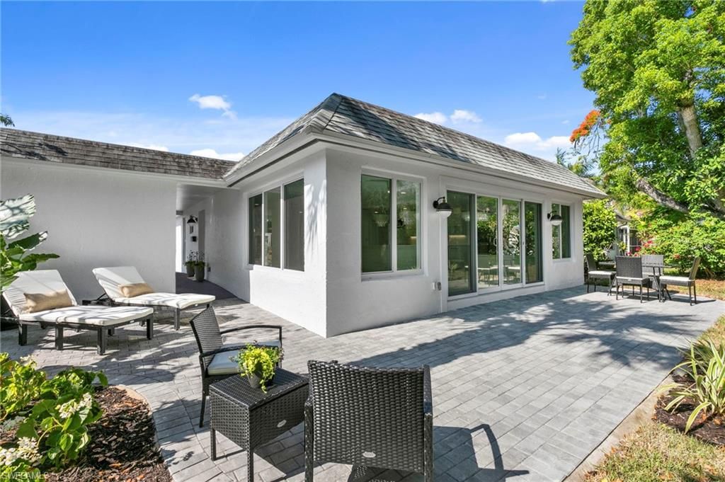 Photo of 17 Knights Bridge RD, NAPLES, FL 34112 (MLS # 226005796)