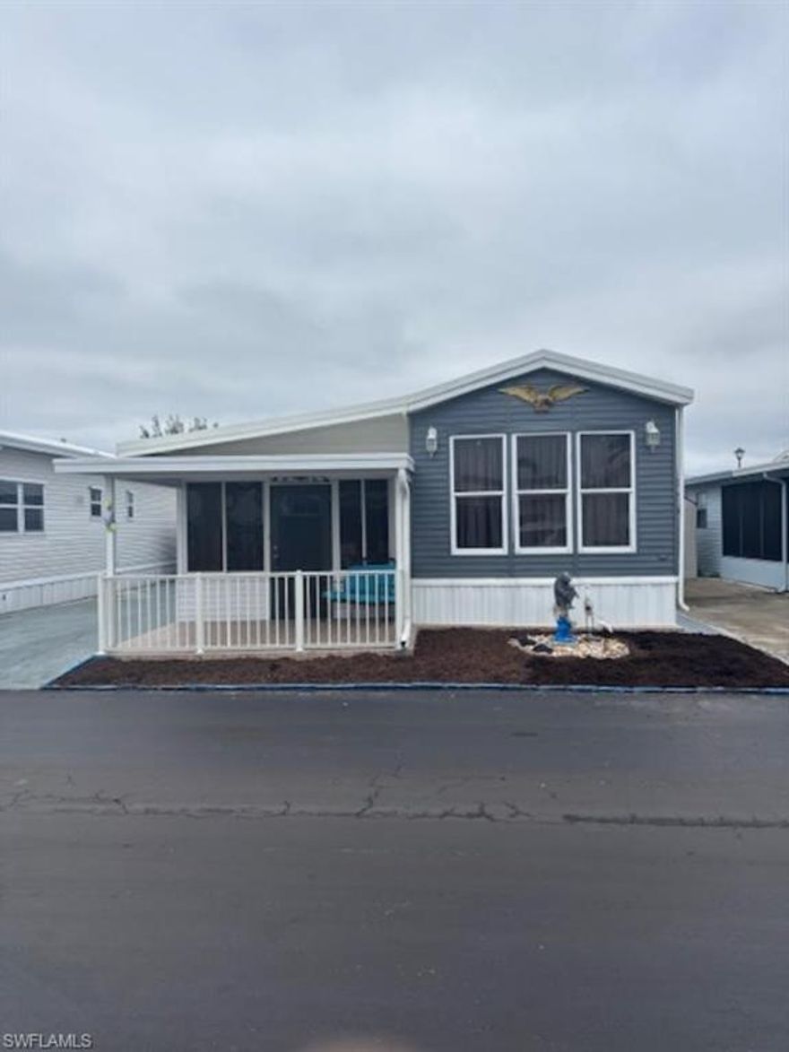 Own your land,  Holiday Condo is the place to be!  Pet friendly!  This home features a spacious living room with plenty of room to entertain.  Steps up to the open dining area and kitchen.  All appliances included.  Master bedroom is large with plenty of light.  The bathroom has a walk in shower.  The den/laundry room is spacious, could be extra sleeping area.  There is extra storage under trailer and the storage shed.  Plenty of parking for two cars.  The covered front porch is a great place to have your coffee in the morning.  Holiday Condo has low monthly fees of $167 which includes water, sewer, trash pick up and recreation facilities.  Two heated pools, one indoors with a hot tub and showers.  Pickleball and tennis courts, shuffleboard and bocci are available.  Close to shopping and the beaches.  Your home waits for you.  NOT 55+ community.