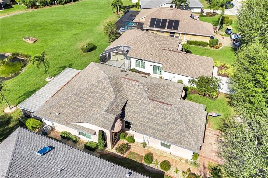 PRICE ADJUSTMENT!!Welcome to this beautifully maintained 3-bedroom, 2 bath ranch located in a sought-after bundled golf community.  This inviting home features an open floor plan designed to capture stunning golf course and sunset views from the great room, large dining area, and expansive screened lanai.  Enjoy peace of mind with newer impact resistant category 5 all 3 sets of sliding doors w electric metal shutter protection, a newer A/c system, and a newer roof -all major upgrades already in place.  The guest bathroom has been tastefully updated with Hydro dimensions walk-in tub, complemented by skylight that fill the space with natural light. The home is offered TURNKEY allowing you to settle in and enjoy the golf, putting green w/ netted driving cages, tennis, clubhouse-w/restaurant and bar all within short walk and relaxed lifestyle the community is known for. Plus HOA includes master and golf fee.