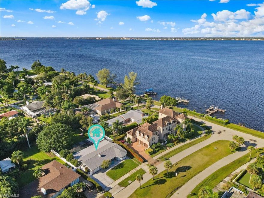 Relish In The Riverfront Breezes & Vivid Views of the Caloosahatchee River From This Old Florida Pool Home In Twin Palm Estates. This Home Features 3 Bedrooms, 2 Baths, Office or 4th Bedroom, Eat-In Kitchen, Formal and Informal Dining Areas, Living Room and Family Room Just Two Doors From the River. Enjoy River Views from the Front Patio, Living Room and Master Bedroom. When You Step Out Onto The Spacious Private Patios You Will Be Greeted By A Deep Pool & Surrounded By Lush Landscaping, A Treehouse Tucked In a Banyan, Concrete Basketball Court, and Complete Privacy. Thoughtful Updates in 2018 include New Paint, Roof, Fence, Kitchen, and Flooring. Plenty of Room for Entertaining and Family Fun In This Rare Oversized Lot In A Highly Desired Friendly Neighborhood Off McGregor Where You Can Walk Along Open Riverfront and Enjoy Amazing Sunsets All Year Long!