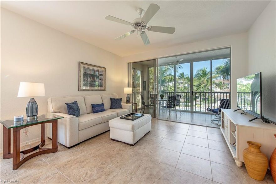 Light and bright describes this nicely maintained 2+den end-unit in the gated Pebble Creek community conveniently located across the street from the Pelican Bay North tram station, providing direct access to Pelican Bay’s private beach. Only these larger end units offer elegant double door entrances. The natural light penetration through the condos many windows is evident from the moment you enter. The flexible floor plan is complete with spacious living room/dining room, eat-in kitchen, master suite, a private bedroom and bath for your guests, plus a den currently setup as a third bedroom. Relax on the spacious lanai overlooking the lake, resort style pool area and tropical feeling setting. Located just a short walk over the charming "pool bridge" to the resort style pool area. The attached garage is located under the building with elevator access to each floor. Some of the exceptionally unique Pelican Bay amenities include: 2 private beach pavilions, with beach services, nature trails, state-of-the-art fitness center, tennis facility, canoes and kayaks and a variety of activities. Located just a short drive away from Artis Naples, and the glamorous Waterside Shops/Dining.