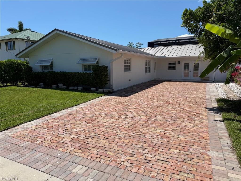 Photo of 112 Capri BLVD, NAPLES, FL 34113 (MLS # 226014396)