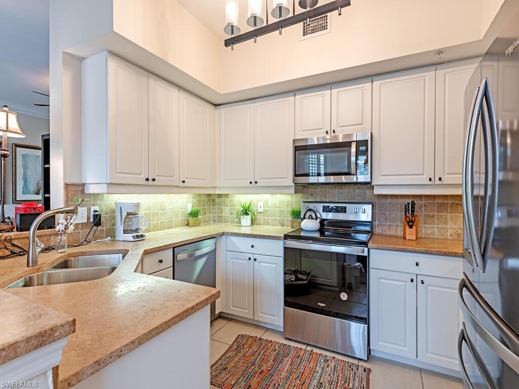 Photo of 1229 Egrets LNDG #102, NAPLES, FL 34108 (MLS # 224007962)