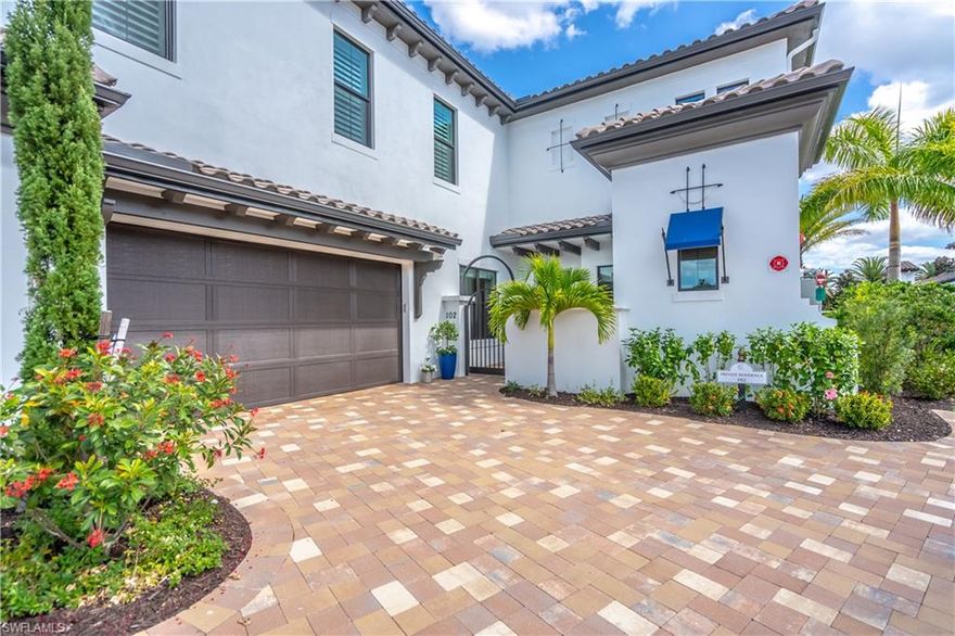 This "Messina” Model is 2021 construction and comes FURNISHED! French Oak floors and tastefully decorated. White cabinetry in kitchen with uppers for extra storage to the ceiling. Additional cabinetry storage off the laundry room area too. Private landscaped views. Separate master suite with spa like bathroom, walk-in closet. Upgraded with a summer kitchen and your own gas grill. Attached 2 car garage with ramp for a space to park a golf cart or for storage. Located on the first floor in building 5 near mailboxes and extra wide drive between buildings. Talis Park's golf course was designed by Greg Norman and Pete Dye and is ranked by Golf Digest as one of Florida's top 20 courses. The Clubhouse (voted Clubhouse of the year 2016 by Golf Inc. Magazine!) “Vyne House” offers a Pilates/Yoga Studio, Core Fitness Center & Esprit Spa plus formal dining and Fiona’s Market Café! Talis Park is now offering a private beach shuttle to Vanderbilt Beach! Sports or Golf Membership purchase required.