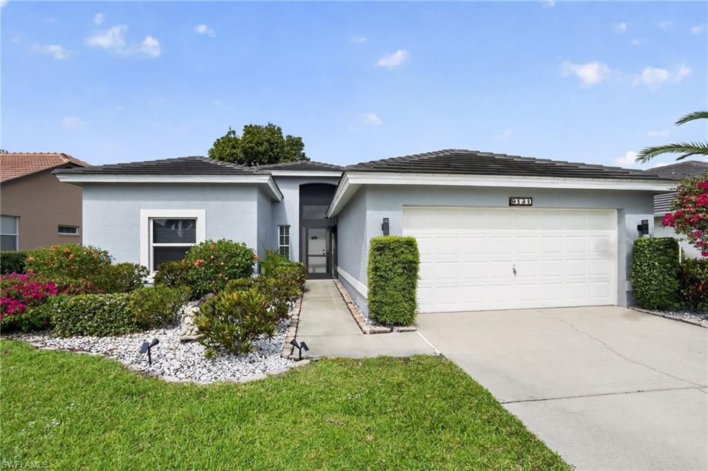 Photo of 9131 Old Hickory CIR, FORT MYERS, FL 33912 (MLS # 226014473)