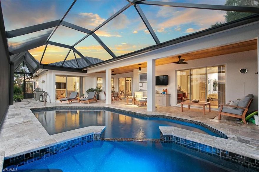 STUNNING water direct tropical retreat in paradise! This 3-bedroom plus den, 2-bathroom home is perfect for anyone who wants to live on the water. With beautiful long canal views and plenty of amenities, this home has everything you need and more. A major attraction of this home is the degree, design and nature of the landscape that have been added to the oversized, corner lot. At the center of this lush haven is a gorgeous fenced courtyard with a travertine stone sitting area and a stone path that meanders throughout the garden. You’ll love the huge master with walk-in closet, luxurious walk-in tub with two Mavisever 36 x 36 LED mirrors. Plus, there’s plenty of space for entertaining friends and family on the lanai or by the pool. And if you need to store any extra gear, there’s even room in the garage. The garage features an epoxy floor and new shelving and cabinets. This home has it all – including a brand new travertine pool deck and spa, and dock with fish cleaning station. The lanai has a 45’ picture frame cage.  There is also  a brand new generator with two, 175 gallon propane tanks and brand new water heater. The pool just had a new heater installed with Wi-Fi controls. They have ensured that sunshine can be enjoyed all year long from their piece of paradise. The home comes turnkey with beautiful, high-end furnishings and all new appliances so you can move right in.