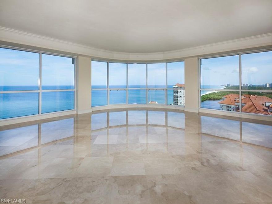 Capture the finest of the seasons. Exceptional architectural specifications featuring expansive walls of glass, marble flooring and spacious living areas, including great room, family room, library, gourmet kitchen and private guest suite. More than 7,700 square feet of living area and a private garage. Spacious, secure with unsurpassed amenities equals the essence of Naples Cay.