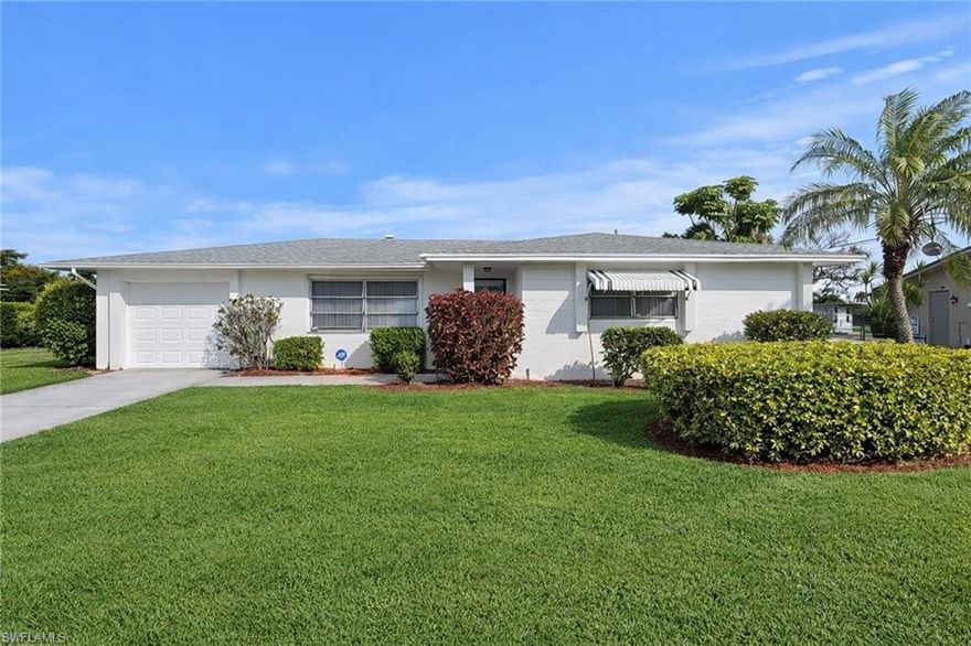 Affordable POOL HOME on CITY WATER AND SEWER! NEW DIMENSIONAL SHINGLE ROOF IN 2024, spacious lot overlooking a canal in the backyard, porcelain tile throughout the main living area, GRANITE kitchen counter-tops and newer appliances were recently added. Large in ground pool with a screen enclosure and oversized covered lanai for entertaining, electric storm shutters on the front window and sliding doors, bathrooms updates include newer toilets and vanities. New well pump for the irrigation system in 2025. Home is being sold furnished and is move in ready! Popular Willow Lake South neighborhood with wide streets and curbs, walking distance to stores, schools, and parks. Just minutes to I-75, Ft. Myers, and SWFL International Airport. Lehigh is the highest elevation in Lee county. No flood insurance required!