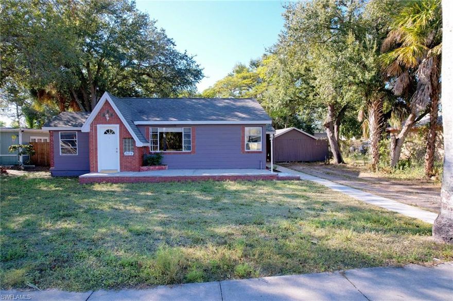 Incredible value in the emerging midtown re-development.  Just blocks from historic downtown and vibrant River District, City of Palms Park, Edison Ford Winter Estates, Restaurants, Park, School, Hospital, Pharmacy, Gas Station and hardware store. The home is not in a flood zone. 1 Yr Warranty on plumbing, electrical, AC and appliances.Original pine wood floor, walls and several Built-Ins. Spacious living area, a bonus room/den off the living room perfect for an extra bedroom or home office.  Laundry room with washer and dryer. LARGE fenced in back yard and car port with covered access to the side door.Great investment opportunity - RS-D zoning allow conversion of single-family residence into a two-unit structure.