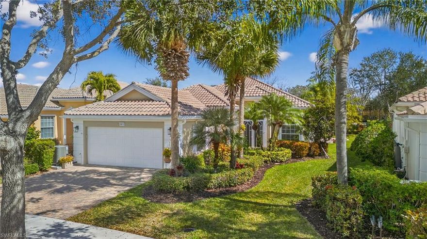 Discover your Florida paradise in the highly sought-after community, Village Walk of Bonita. Available is a desirable Oakmont floor plan that has been meticulously maintained and is move-in ready, featuring three spacious bedrooms, a versatile den or home office and 3 baths. The residence sits on a pretty landscaped lakefront lot and boasts a stunning private backyard oasis, complete with a screened private heated pool, a sundeck—ideal for relaxing, entertaining, and enjoying SW Florida’s beautiful weather with family and friends. The home feels welcoming the moment you enter, with volume ceilings, neutral color palette and its open design that enhances its inviting atmosphere. Exceptional interior features include porcelain tile throughout the home—no carpet for easy maintenance, plantation shutters, 8 ft. doors, crown molding, stylish light fixtures and ceiling fans throughout the home enhance the style and comfort. You will love the kitchen as it is the perfect gathering spot for entertaining with its shiny Quartz to include the island-style counter. Kitchen is equipped with KitchenAid SS appliances, a stainless-steel single bowl sink and convenient pull outs in the lower cabinets and pantry. The owner's suite stands out for its abundance of closet space, slider for direct access to the pool and unique his-and-her bathrooms, including a convenient walk-in shower with frameless shower doors. The dedicated laundry room features built-in storage cabinets and a utility sink, while all closets throughout the home are equipped with modular organizers. For peace of mind, hurricane protection is provided by easy pull-down metal shutters and electric shutters on the lanai.  Additional features include a side yard paver patio deck, garage mini split and new HVAC 2024. Nautica Lane is just a short walk, bike or golf cart ride to the amenity rich town center that offers something for everyone: resort style & lap pools, 24/7 fitness center, lighted Har-Tru tennis courts, pickleball center and bocce all with active leagues. In addition, there is a lighted basketball court, tot lot, full-service restaurant w/indoor and outdoor dining, beauty salon, bagel shop, spa, ice cream shop, and lots of planned activities by the full-time Activities Director. VillageWalk of Bonita is unique with it’s pretty butterfly gardens, miles of lakes, sidewalks, walkways over connecting bridges and impressive wildlife. Guard gated, golf cart and pet friendly. It’s a great location to our beautiful sandy beaches, SW Florida International Airport, shopping, entertainment destinations and coming soon the highly anticipated Midtown Bonita a new shopping and restaurant experience. This is SW Florida living at its best, a great place to call home!