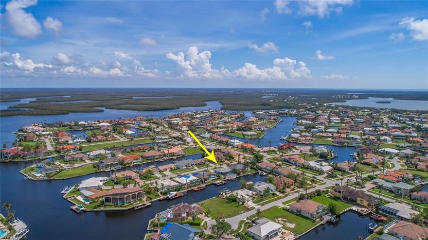 Why buy a condo when you can enjoy casual, care-free coastal living in this adorable 2 bedroom, 1 1/2 Jack 'n Jill bath beach cottage offered turnkey/furnished and LISTED AT LOT VALUE that hits all the right buttons. Quick direct boating access to the Gulf of Mexico through the Marco River, an ample dock and lift and perfect southwest exposure that blankets sunlight all day long on the heated pool featuring a new brick-paver deck. Recent multiple upgrades and renovations include new air conditioning system, new pool heater, new appliances, circuit breaker panel, exterior and interior paint, kitchen back splash, new vanities and toilets, new bedroom carpeting and lighting fixtures. Terrific rental potential or a foot-in-the-door Marco Island direct access property that may be used now at a lot value investment for a future build. The home currently has over $14,000 in rental bookings for the 2017-2018 season.