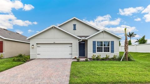 Photo of 1692 POINSETTIA AVE, LEHIGH ACRES, FL 33972 (MLS # 226016928)