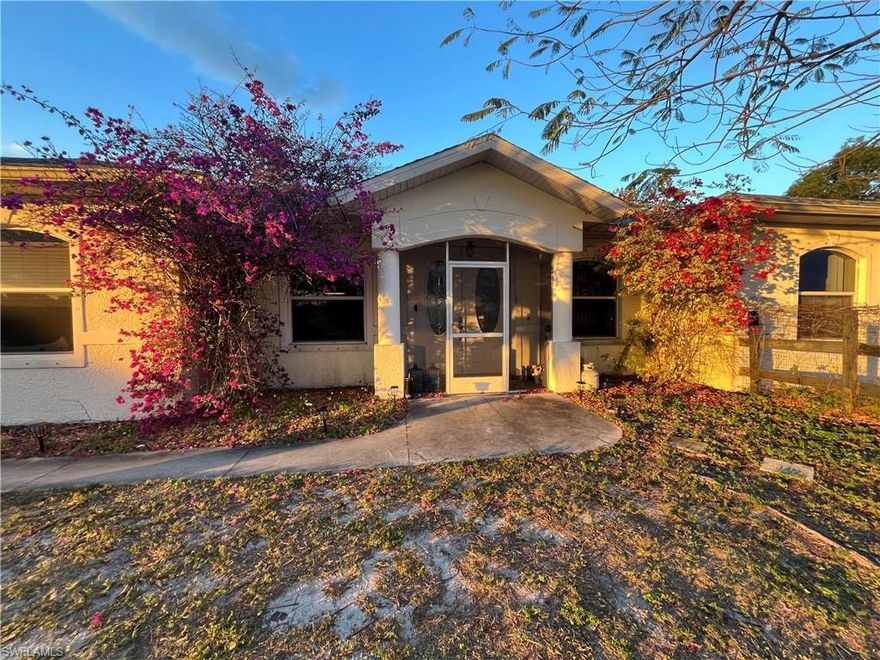 A long paved driveway leads you first the a hurricane safe barn under central ac. This barn has a central AC six outlets, is insulated and covered in wood. It could also serve as a work shop. Water is in and outside available. Follow the driveway and you reach the Family pool home with a new GAF hurricane shingle roof( 135 mls p hour. This home has a new whole house Generac generator. Even the ac in the newer barn is connected. At the end of the driveway there is a 3-4 stall horse barn with tack room ( ac) and a lanai in the back to overlook the lake and the pastures. This barn is completely strapped down with Simpson ties we never had hurricane wind problems within all these kinds of preparedness. No flood zone no flood insurance necessary The house is far away from the noise of any street but it's not in the middle of nowhere. 3 Publix in 5-10 minutes are available. Enjoy a drink at the pool. 5.6 acres awaiting you. Last but not least included is a Guest House ( Tiny Home) with Double Bed, Bathroom, Walk in Shower, window in Bath. Kitchen complete with real oven. Central Vac, A/C  Television. Completely hooked up to sewer and with water connection. In unused condition. Could work as a money maker ( Rbnb). Another money maker could be: Building up inside the fully covered 40 ft extended high container ( 9.5 high) on the side of the older barn.
