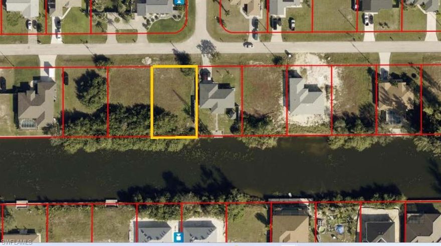 Lovely lot on a canal in the fast growing Cape Coral neighborhood!  Close to shopping, schools and beautiful Gulf Coast Beaches.
