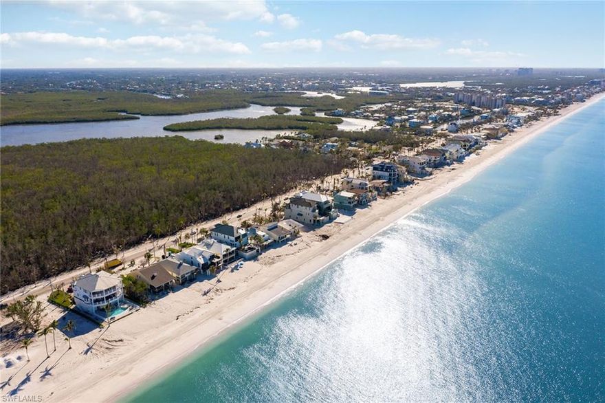 Purchase your dream home on this magnificent beachfront, extra-large lot on Bonita Beach. With over 3,100 square feet under air, the open floor plan includes 4 bedrooms, 3 full baths and 2 half baths home and a loft for your extra guests making the many features a very special home. The fireplace for those few, cold winter nights opens out to both the living area and the large, master bedroom suite. Two other bedrooms on the main floor have their own en-suite baths. On a street with mostly renovated and newer-built homes, experience wonderful views of the Gulf of Mexico, awaken to the sound of waves lapping on the shores of this beautiful beach and end your day with glorious sunsets. Experience Southwest Florida living at its best. The buyer is responsible to complete the remaining repairs needed to the home as a result of Hurricane Ian damage. The property is being sold as-is. There is a wide expanse of beach with no beach erosion issues on this lot. Come and live out your dreams in the Florida warmth and sunshine.