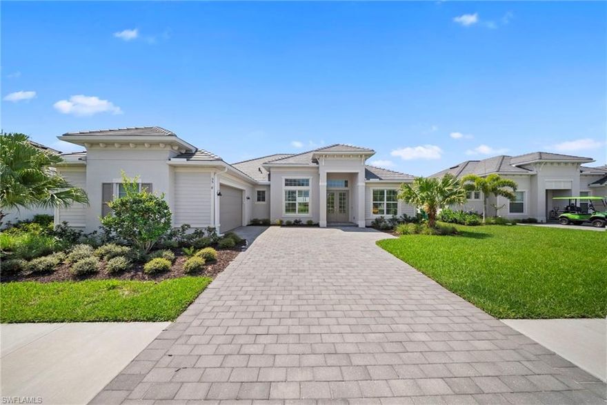 Experience luxury living in this move-in-ready Lakeside model home located at 5508 Whistling Straights Court within the prestigious National Golf & Country Club at Ave Maria. Spanning approximately 2,755 square feet, this elegant 2023 residence features four spacious bedrooms, three full bathrooms, and high-end finishes throughout. The open-concept interior flows seamlessly to an expansive covered lanai, where you can enjoy a private pool, Jacuzzi, and custom-built grill against a backdrop of panoramic lake and golf course views. As a resident, you'll enjoy a social membership, a resort-style clubhouse with fitness and dining, and vibrant pickleball and tennis courts, all situated within a quiet, top-rated community.