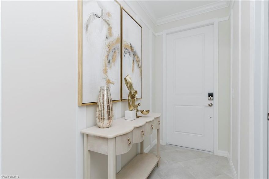 Location is everything! This brand-new Birkdale floor plan offers unbeatable convenience with a satellite pool just steps from your front door and breathtaking golf and lake views from the screened lanai. Featuring 2 bedrooms and 2 full baths, this beautifully decorated condo includes a full club membership with optional golf, giving you immediate access to all that The National Golf & Country Club has to offer. Designed for both comfort and style, the open-concept living space is ideal for relaxing or entertaining. From the moment you enter, you'll be drawn to the scenic views overlooking Hole #9 and the community’s largest lake, creating a peaceful, resort-style ambiance every day. Just a short walk away, the resort amenity center awaits with an attended fitness center, spa, resort-style pool, and the Bar & Grill. Whether you're enjoying a round of golf, lounging poolside, or catching a stunning sunset from your lanai, this home delivers the ultimate Florida lifestyle. Full club membership is transferable, with optional golf included, making it easy to enjoy the championship course and first-class amenities.