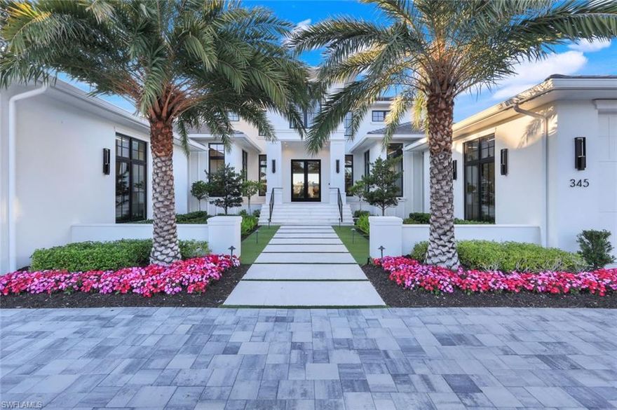 The Good Life. On one of the most beautiful Lanes in Naples, with dazzling direct waterfront views, your glorious next chapter begins. Amidst a landscape of indistinguishable new houses, this exceptional custom designed residence features the finest finishes, superior materials and quality workmanship caringly brought to life with warmth and agelessness. Penned by noted Architect, Lars Young and crafted by the prominent Builder, D. Roth Construction, it is a truly elegant yet extremely comfortable home. Positioned perfectly on Compass Cove, you will experience incomparable sunsets and the singular pleasure of gulf access from your own backyard. The intelligent plan throughout this property will excite the most discerning boat enthusiast, thrill the seasoned gourmand and please those who simply love to entertain, escape and relax. An enormous Great room with European white oak flooring complements the designer furnishings, exquisite cabinetry and stunning stone work.  The adjacent lanai and outdoor kitchen serve as an extraordinary large living/dining space leading to a gorgeous pool and spa with an infinity edge basin. Along with all the upscale brand appliances befitting a property of this level, you will be delighted to find an outdoor Pizza oven, a LG Steamer in your California Closet and mood-enhancing fireplaces. A cleverly placed expansive butler’s pantry houses additional storage and luxe equipment. The primary suite includes two walk-in closets, two water closets with Neorests and an enchanting separate study. Your guests can select from a ground floor private casita or from two spacious upstairs ensuite bedrooms. The exclusive Moorings beach park and Venetian Village restaurants and boutiques are just minutes away,