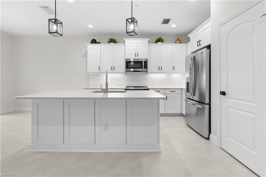 Available for annual rental, this spacious and beautifully maintained 3 bedroom, 2 bathroom second floor carriage home in Avalon of Naples offers 1,725 square feet of comfortable living space with a 2 car garage. Pets are welcome, and the unit already includes installed gym equipment, making it ideal for those who enjoy working out from home. The Whitehaven floor plan features 12 x 24 tile flooring, an upgraded kitchen with light cabinetry, quartz countertops, stainless steel appliances, and impact resistant windows and doors for added comfort and security. The only utility paid separately is electric. Avalon of Naples is a charming community set on over 23 acres just minutes from Downtown Naples, with nearly 6 acres of natural preserve space and a large central lake. Residents enjoy access to a clubhouse, sparkling community pool, and spacious sundeck, all while being conveniently close to Naples’ white sand beaches, world class shopping, dining, and entertainment.