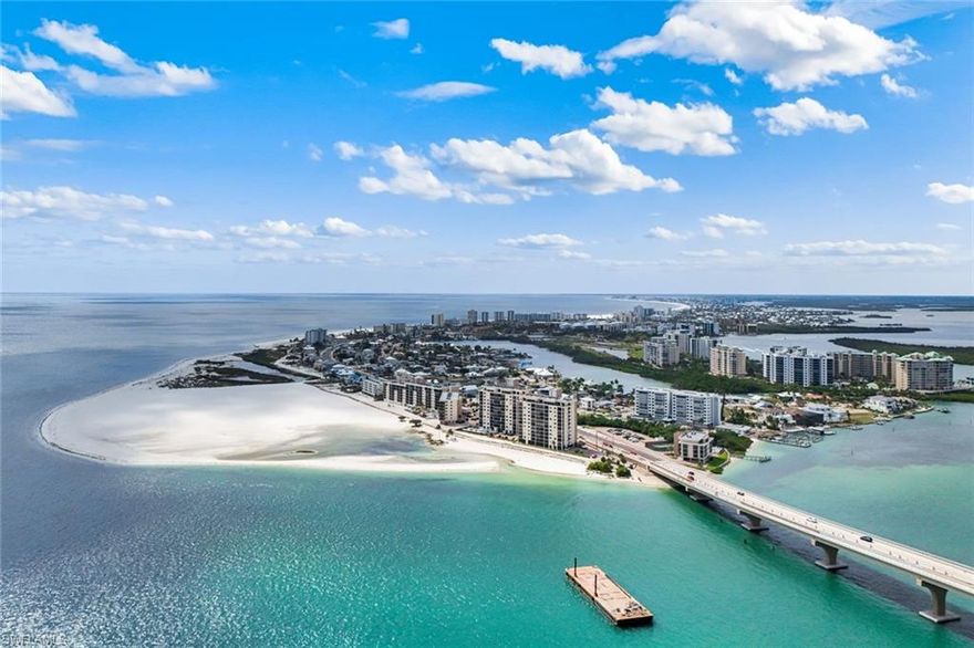 A fantastic rental investment or idyllic seasonal getaway, this fully renovated 6th-floor end-unit at Islands End is perfectly positioned at the very tip of the peaceful south end of Fort Myers Beach—where the shoreline stretches wide, the beach is quite literally your backyard, and the views remain forever unchanging. From the shimmering Gulf of Mexico to Estero Bay, Lover’s Key State Park, and the protected preserve beyond, this is a panoramic setting with no buildings to interrupt your sightlines—offering sunsets to the west and sweeping vistas south all the way to Bonita Springs. Inside, the residence has been completely refreshed with a clean, coastal-modern aesthetic. The kitchen features quartz countertops, a stylish backsplash, and stainless steel appliances, opening to a light-filled living space enhanced by the additional windows only an end unit can offer. New wood-style tile flooring runs throughout, paired with a freshly painted interior that amplifies the bright, airy feel. Both bathrooms have been updated with new vanities, hardware, and beautifully tiled showers. Multiple outdoor spaces invite you to take in the surroundings from every angle, including an open-air balcony off the dining area and a glassed-in, screened lanai that can be enjoyed year-round—each capturing a different perspective of the water, sky, and passing boat traffic at Big Carlos Pass. The two-bedroom, two-bath layout offers comfort and flexibility, equally suited for personal use or hosting guests. Islands End is a unique coastal community spanning both Gulf and bay, with beachside amenities including a pool, grills, bocce, and sand volleyball, along with access to a separate bayside setting across the street featuring a kayak launch, tennis, boat dock, and additional pool. Set in one of the most tranquil stretches of Fort Myers Beach, this is a rare opportunity to own in a location that feels worlds away—yet remains connected to it all—making it a fantastic rental investment, seasonal escape, or forever retreat.