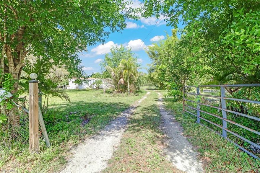 Cash buyers only.
Oversized property with 2.38 ACRES and small lake on the property frontage. Property includes Hurricane/storm resistant windows with concrete finishes. Includes all new roof, water purifier, and central air system, all under 5 years old. BACK ON MARKET,  WILL NOT LAST!