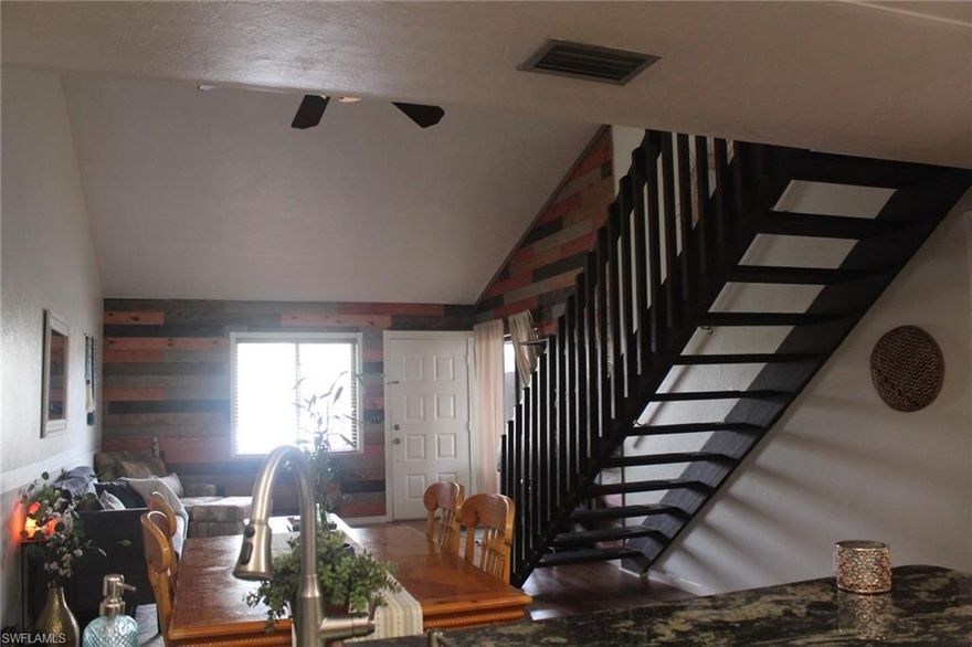 This bright & cheerful Gated Community Townhome is conveniently located off of College PKWY and South Point in FT Myers.  Shopping & restaurants within walking distance.  Community Pool/Spa a short walk from your unit. New HVAC , New Flooring on ground level. The Kitchen is updated with granite counter tops, newer appliances and re-modeled baths. The Upstairs loft does adjoined the second bedroom & bathroom for that perfect cozy lounging area or enjoy your quiet evenings in your screened  courtyard/patio area. Whether looking for your forever home or winter getaway, this easy care townhome will meet all your expectations! Located minutes from our SW Florida beaches and within walking distance to restaurants.  30 minutes to RSW.