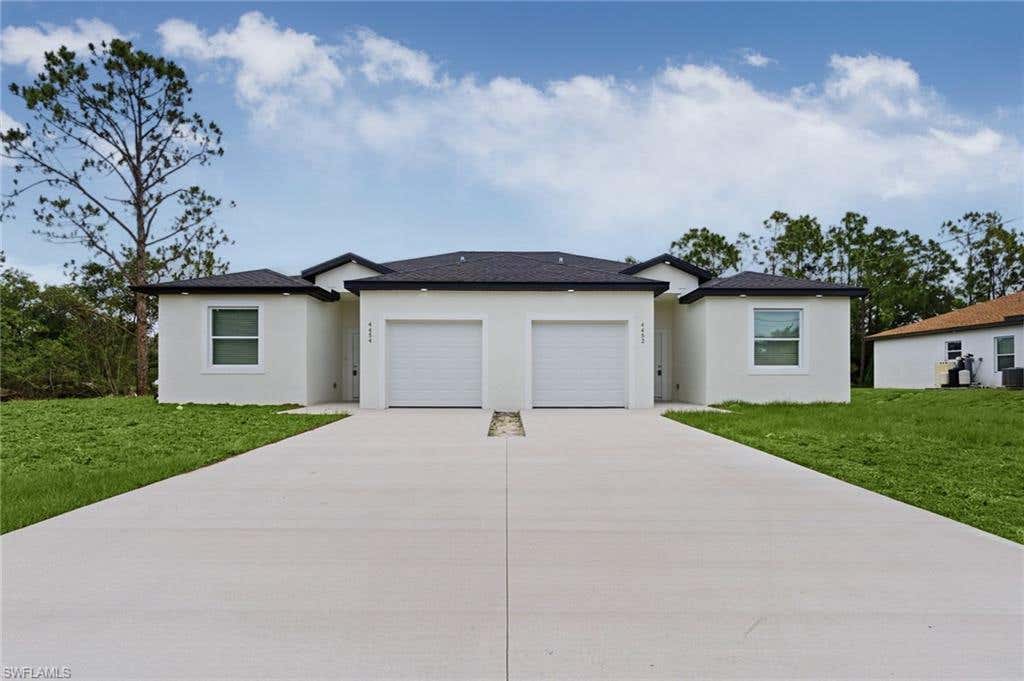 Photo of 4452-4454 25th ST SW, LEHIGH ACRES, FL 33973 (MLS # 226023439)