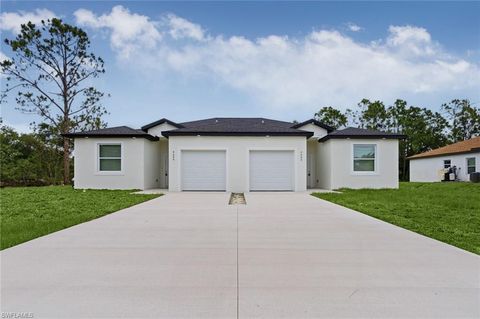 Photo of 4452-4454 25th ST SW, LEHIGH ACRES, FL 33973 (MLS # 226023439)