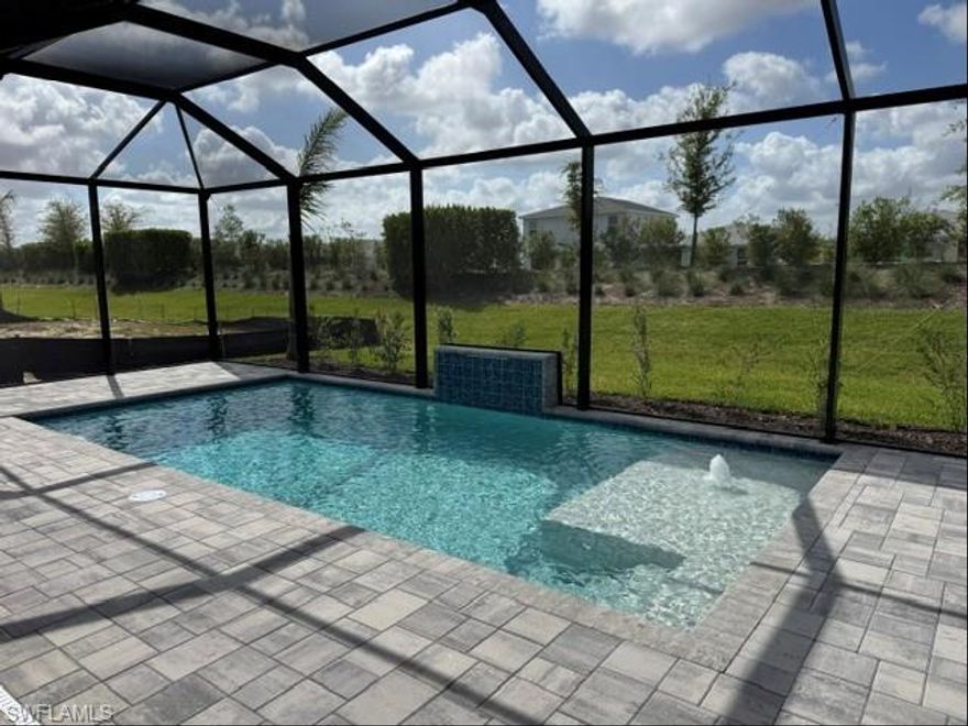 Step into this exceptional newly built luxury home, set within an exclusive 55+ gated community designed for resort-style living. The home boasts a south-facing backyard with lush landscaping, a sparkling screened-in pool, and an expansive covered patio—perfect for relaxing in the shade or entertaining guests outdoors. Inside, a thoughtfully designed open floor plan seamlessly connects the great room, kitchen, and casual dining area, creating an inviting space ideal for hosting family and friends. Carefully curated design elements are featured throughout, bringing warmth, elegance, and personality to every room. The primary suite serves as a serene retreat, featuring a spa-inspired bathroom with dual vanities, a spacious walk-in shower, and a generous double-sided walk-in closet. Guest accommodations include Jack-and-Jill bedrooms that offer both privacy and convenience, while a flexible bonus room can easily function as a home office, den, or hobby area. Constructed to modern building standards, this home includes impact-resistant windows and doors and is backed by a builder warranty for added reassurance. Residents enjoy access to a private amenity center offering a full-time lifestyle director, state-of-the-art fitness center, resort-style pool, pickleball and tennis courts, a golf simulator, and a variety of social activities. For additional details, including interior design selections and floor plan, please refer to the MLS supplements. Lot 4730.