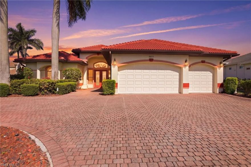 This distinguished 3-bedroom, 2.5-bath waterfront residence offers an exceptional blend of refined design, modern functionality, and premier Gulf-access living. Ideally positioned on an oversized triple lot at the end of a quiet cul-de-sac, the property provides both privacy and an impressive sense of space, complemented by a circular brick paver driveway and an expansive 3-car garage. New barrel shape tile roof installed in 2023. The interior is defined by soaring cathedral ceilings and an open-concept floor plan, creating a light-filled and sophisticated living environment. A generously sized kitchen with abundant workspace and storage serves as the centerpiece of the home, seamlessly connecting to the main living and entertaining areas. Designed with both comfort and peace of mind in mind, the residence is equipped with impact-resistant sliders and a hurricane impact front door. In addition, the home has electric roll-down shutters protecting the lanai, and additional shutters for all remaining openings. A whole-house generator, fueled by a 500-gallon buried propane tank, ensures uninterrupted functionality. An integrated intercom system further enhances convenience. Outdoor living is equally impressive, featuring a spacious screened lanai, resort-style pool, and a summer kitchen—ideal for year-round entertaining. For boating enthusiasts, the property offers direct Gulf access with only minutes to open water, along with a concrete dock and private boat lift.