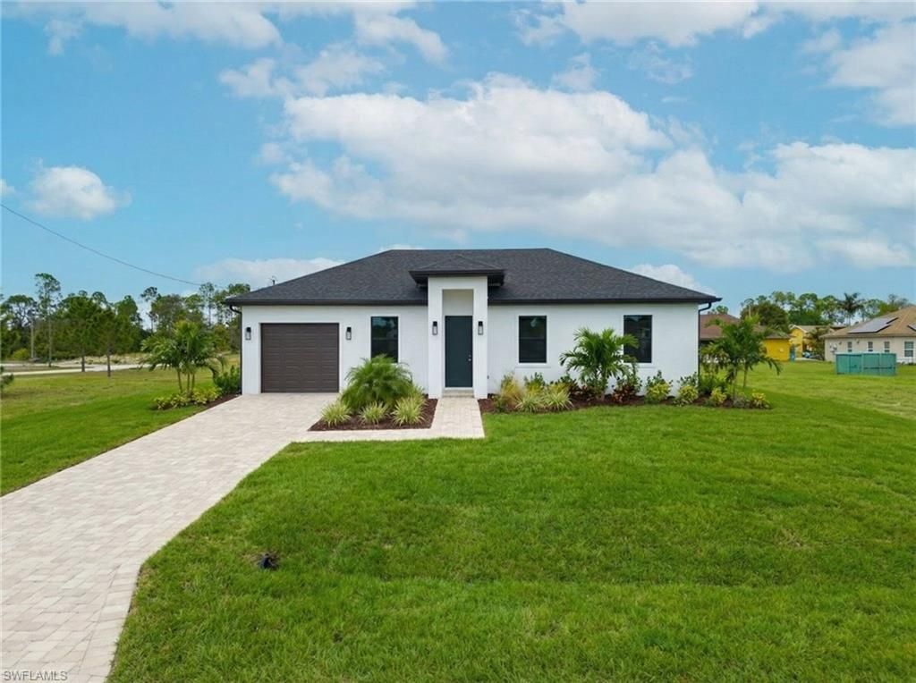 Photo of 1211 Delores ST E, LEHIGH ACRES, FL 33974 (MLS # 226012933)